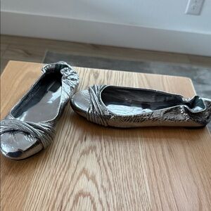 Burberry Metallic Silver Ballet Flats with Twisted Toe Detail